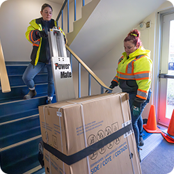 workers using stairclimber
