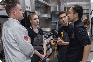 kitchen workers conversing